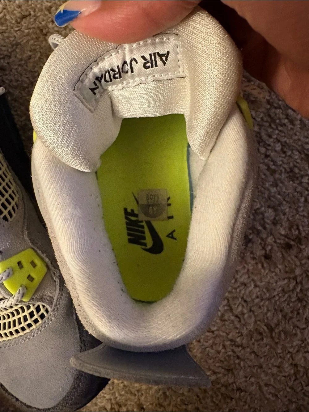 Retro 4 grey and neon green Jordan’s
